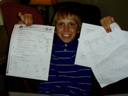 Alex with his hard-earned grades!